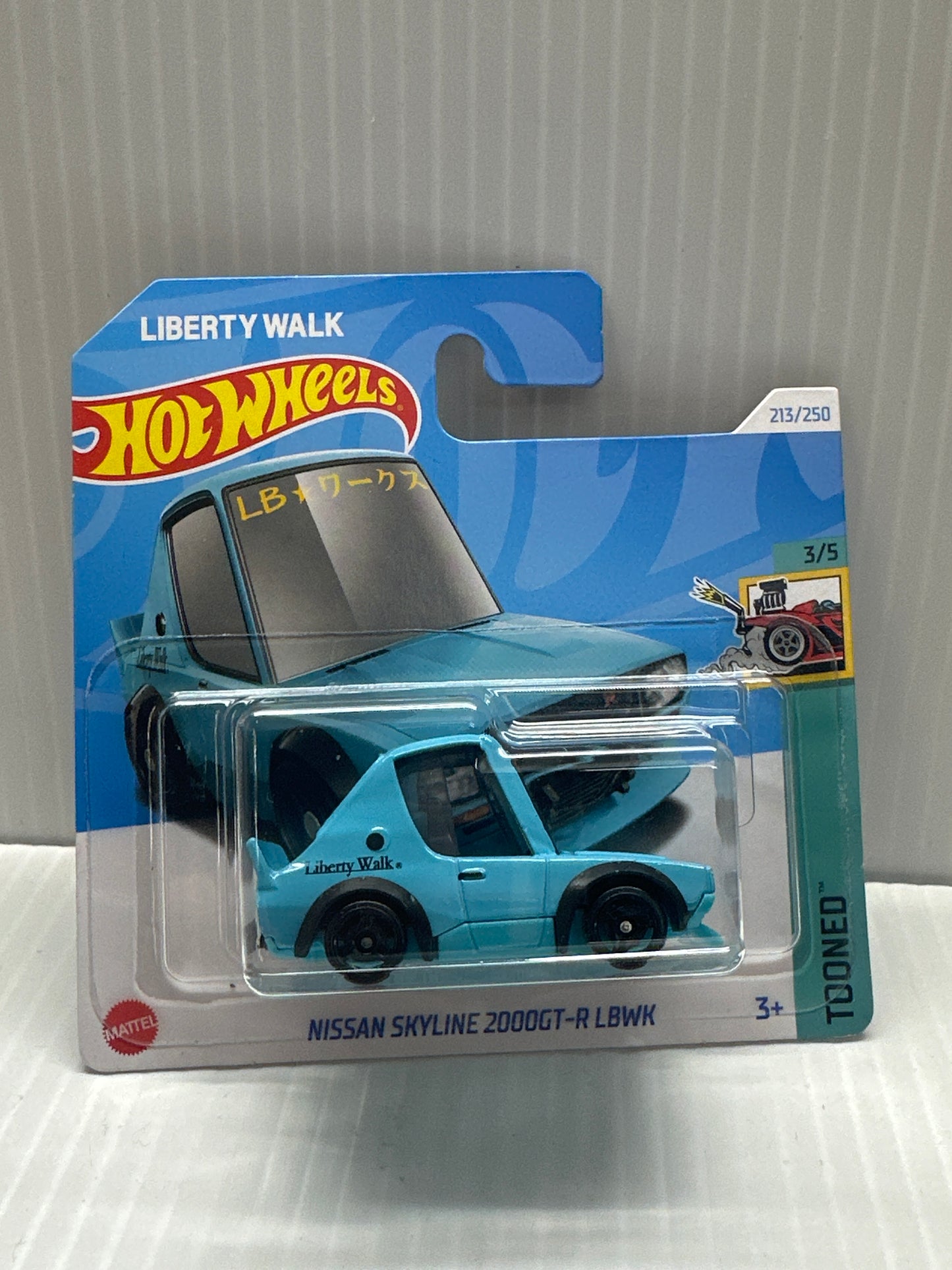 HOT WHEELS 2024 TOONED 3/5 - NISSAN SKYLINE 2000GT-R LBWK BLUE SHORT CARD