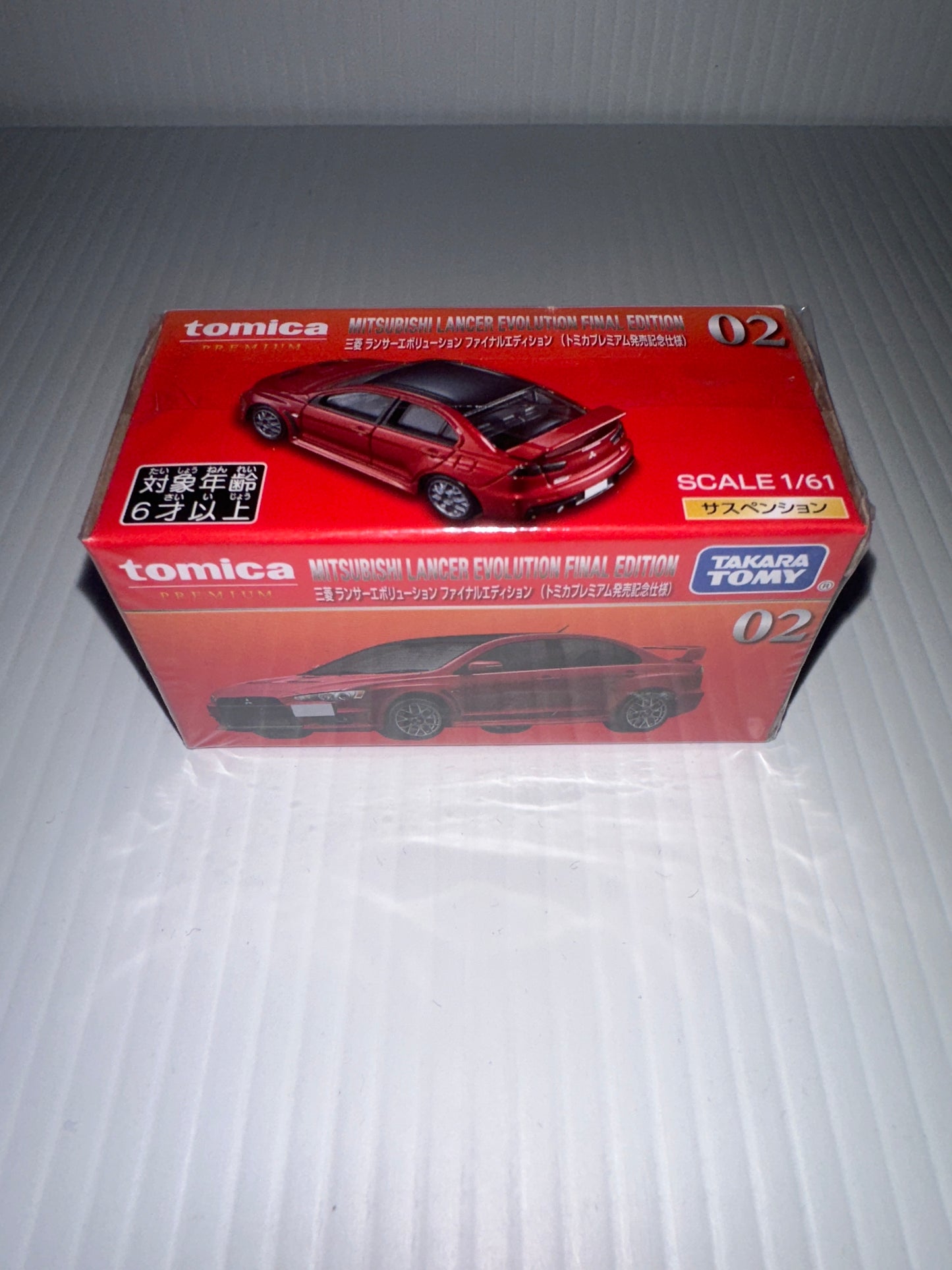 Tomica Premium red box Mitsubishi lancer evolution finial edition red no 2 1.61