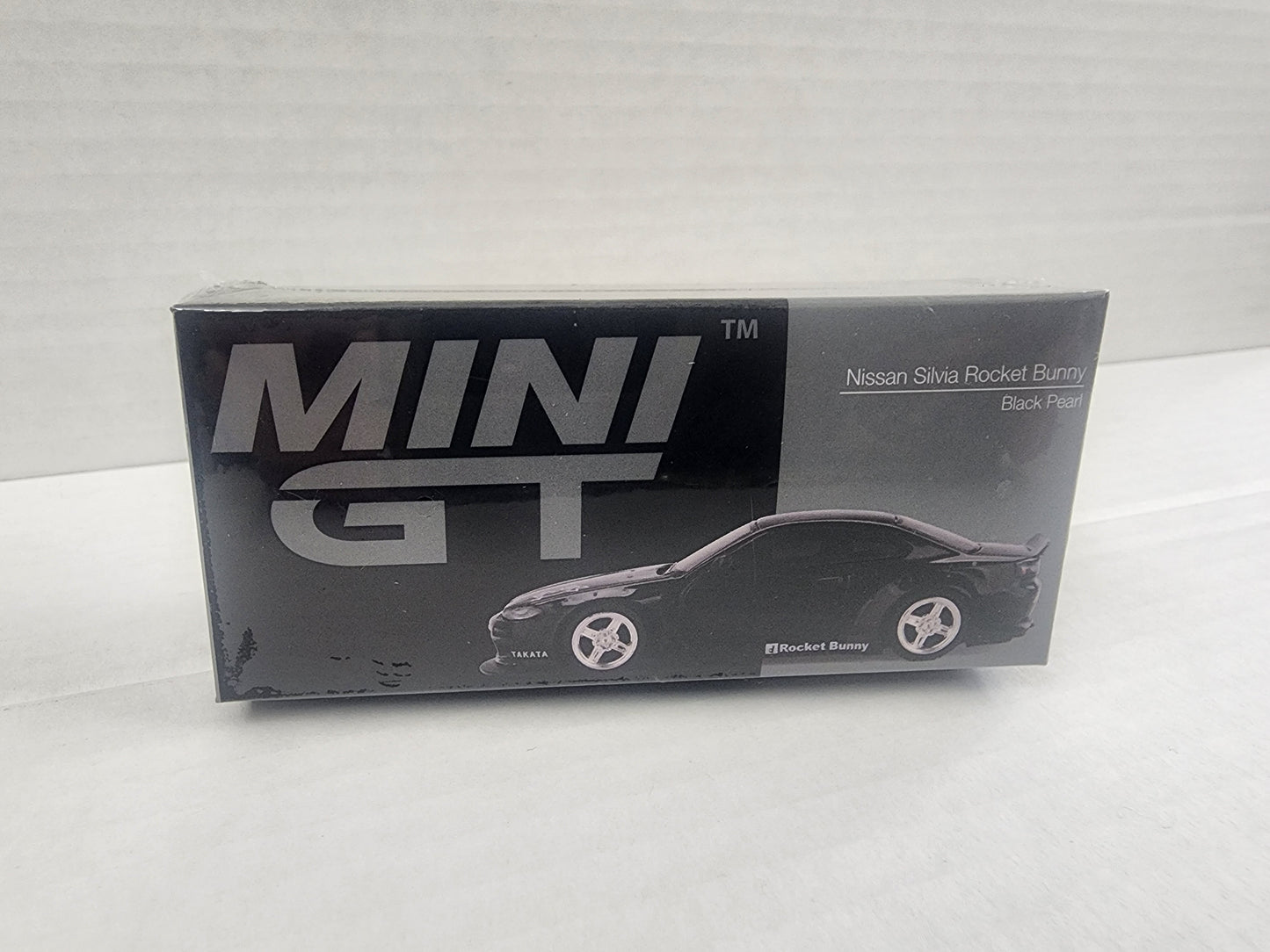 Mini Gt  1/64 Nissan Silvia Rocket Bunny Black Pearl