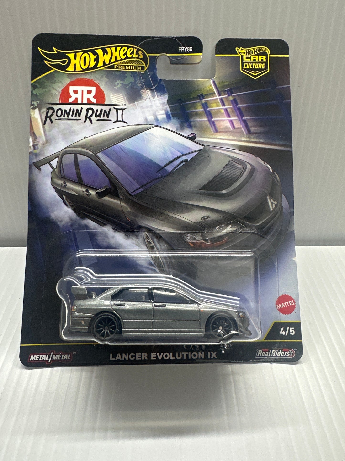 MITSUBISHI LANCER EVOLUTION IX GRAY DIECAST MODEL CAR BY HOT WHEELS