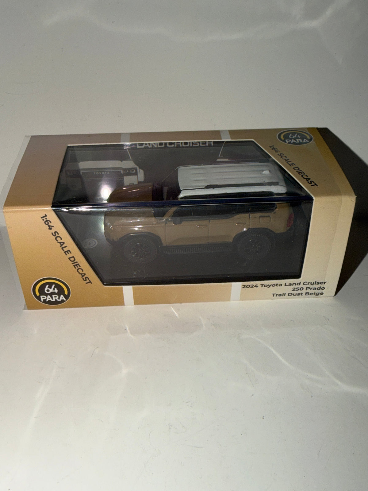 64 Para 1/64 Toyota Land Cruiser LC 250 Prado LHD Trail Dust Beige