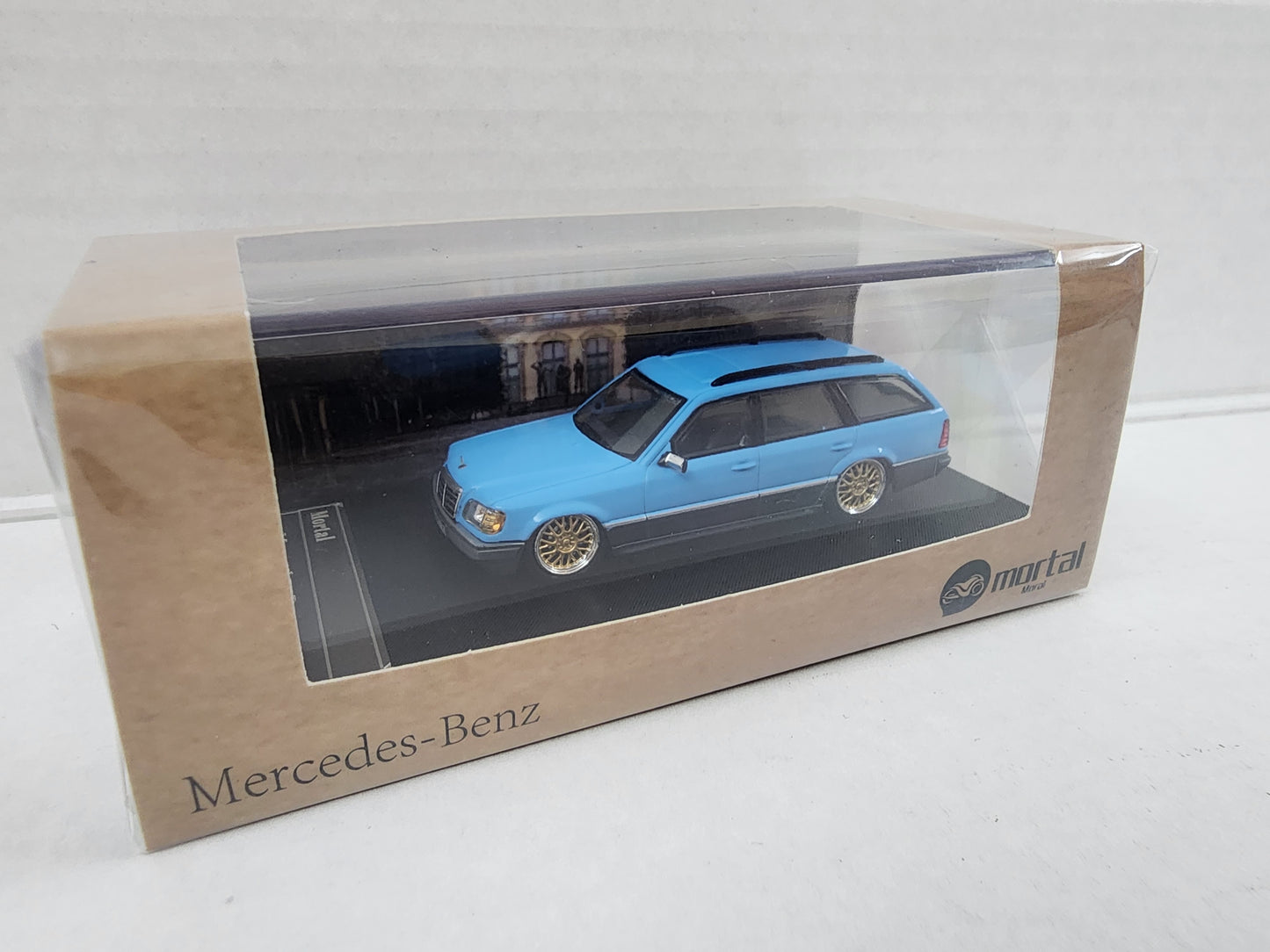 Mortal 1/64  Mercedes-Benz E-Class S124 Wagon Baby blue on grey