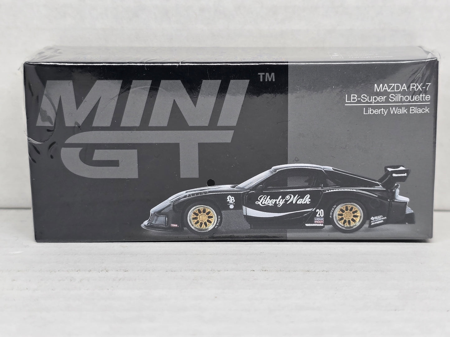 Mini Gt 
Mazda RX7 
Lb Super Silhouette 
Liberty walk Black