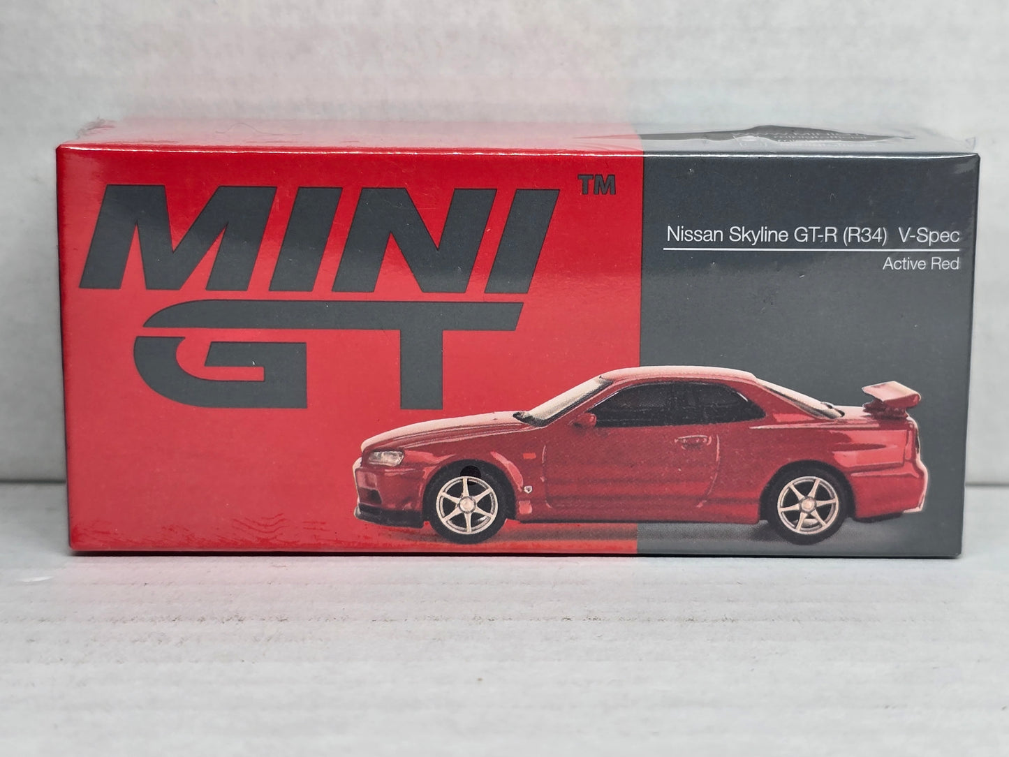 Mini Gt 
Nissan Skyline GTR V SPEC
Active Red