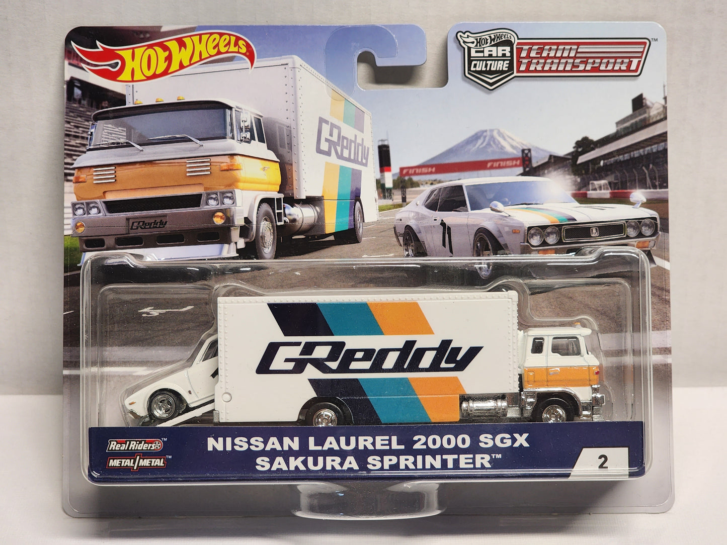 Hot wheels 

Premium 

Team transporter

Greddy 

Nissan Laurel 200 Sgx and Sakura Sprinter 

No.2

 